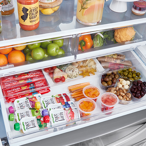 Interior of fridge filled with food