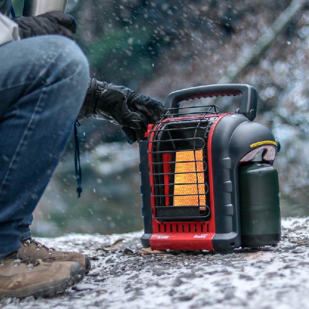A person operates a Buddy in the snow