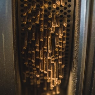 Traeger pellets coming thru the pellet press. Traeger pellets coming thru the pellet press.