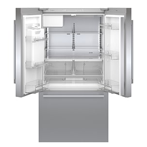 Empty Bosch refrigerator with doors opened