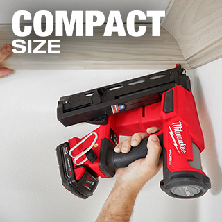 Man easily uses compact cordless finishing nail gun overhead to reach corner of crown molding.
