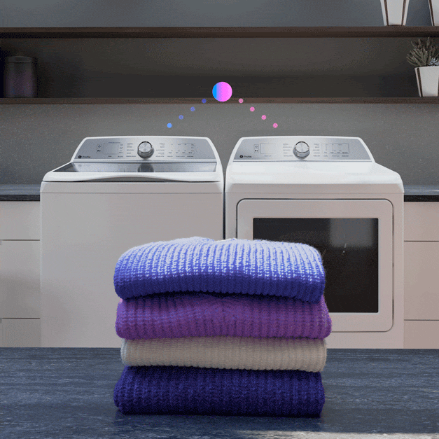 The washer and dryer sit next to one another. Lines overlaid on the image signify the settings being transferred between them.
