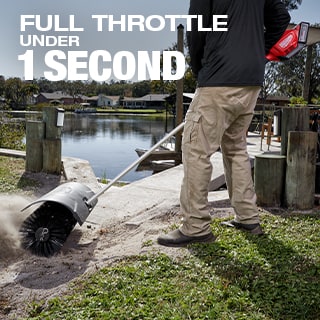 Milwaukee 49-16-2741 M18 FUEL QUIK-LOK Bristle Brush Attachment Worker using the M18 FUEL QUIK-LOK Bristle Brush Attachment