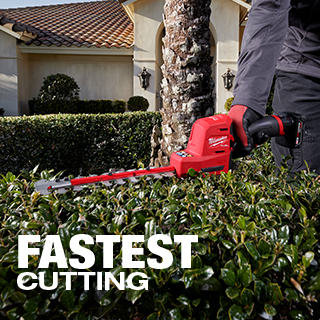 Worker using the M12 FUEL 8 Inch Hedge Trimmer for fastest cutting speed