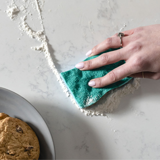 Scrunge sponge wiping countertops Scrunge sponge wiping countertops
