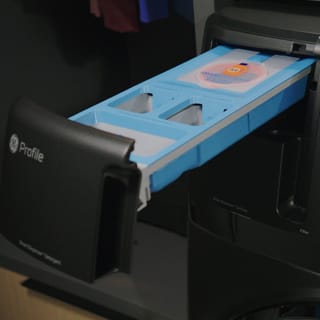 A close-up of the detergent dispenser.