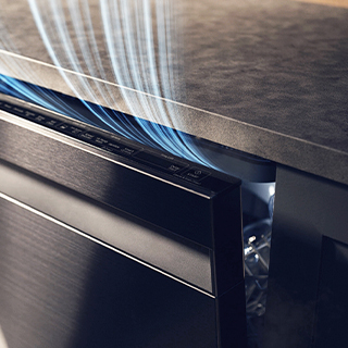 Image showing top of dishwasher, with lines indicating steam coming out.