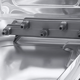 Image of Zone Booster™ feature inside of dishwasher, with water streaming down.