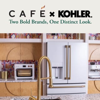 A stylish kitchen. Cafe appliances are installed and their handles are complimented by a Kohler faucet with a matching finish.