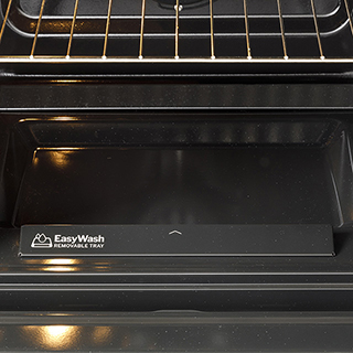 An in-oven view of interior bottom of oven showing flat surface for easy cleaning.